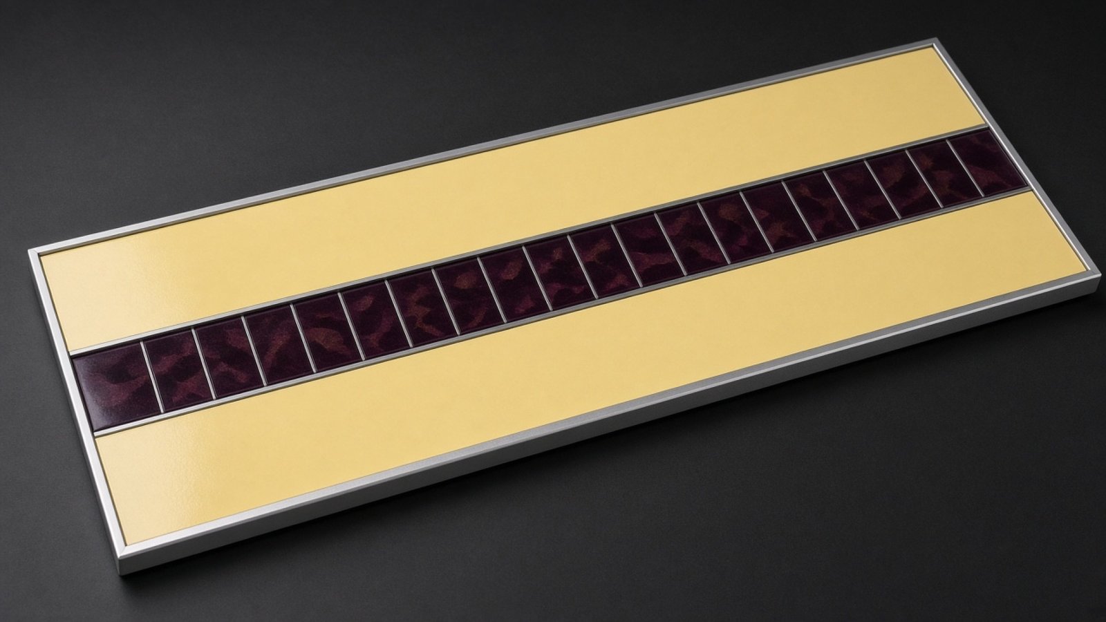 Butter-yellow lacquered board with a dark character-cell strip.