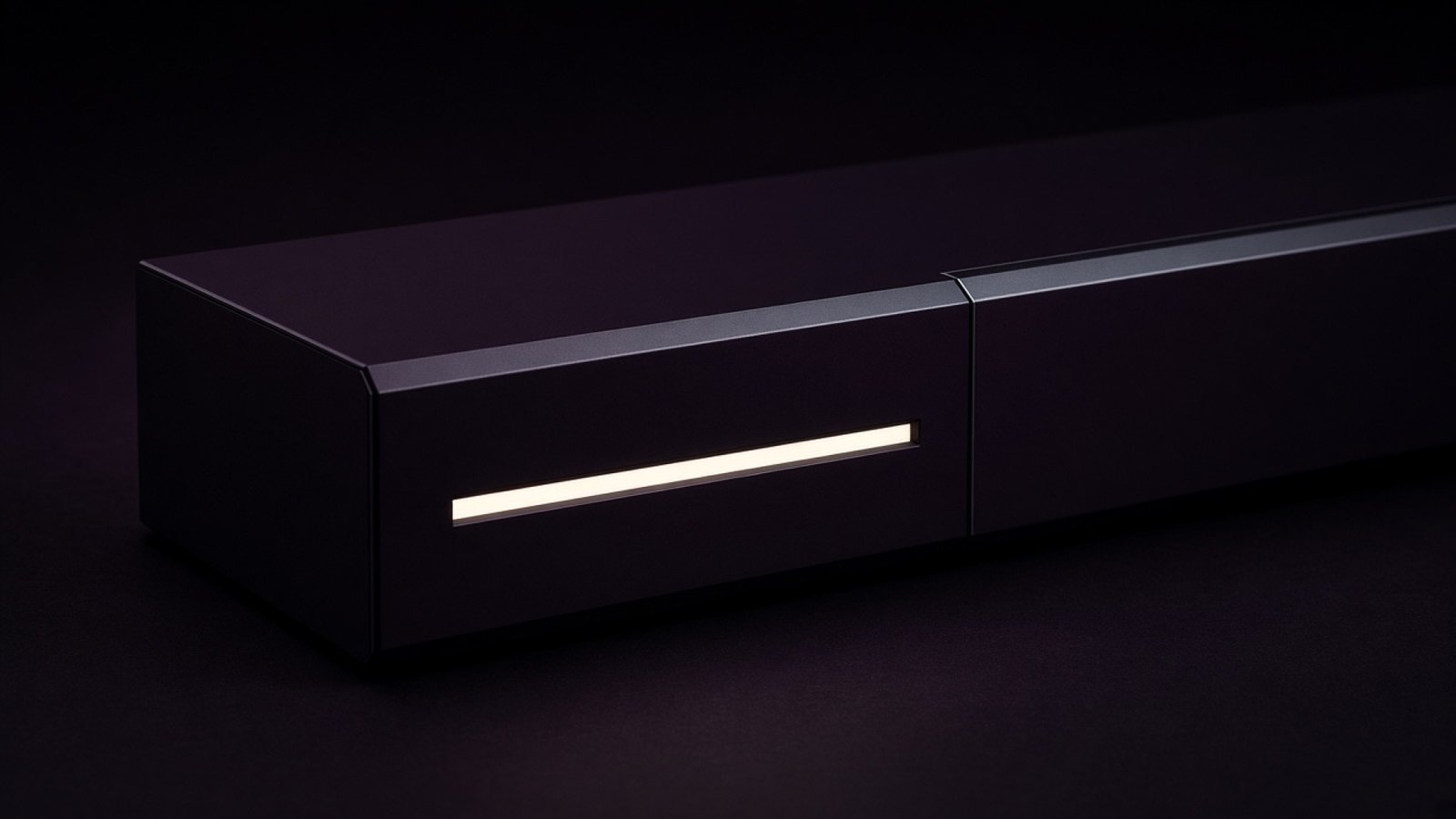 Dark precision housing with a single cream light slit.